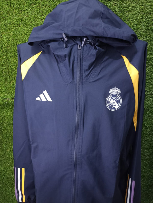 ROMPEVIENTOS REAL MADRID 2023 AZUL