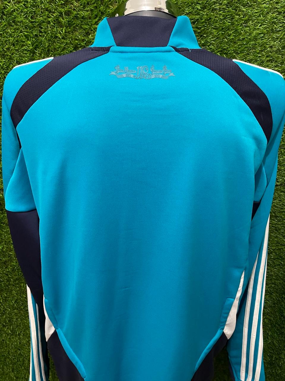 SUDADERA PREMATCH REAL MADRID UTILERIA