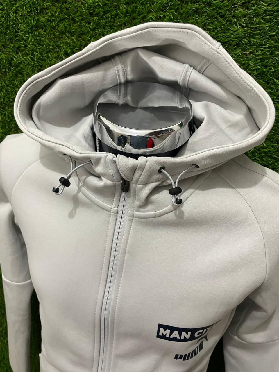 SUDADERA CON GORRO MANCHESTRE CITY