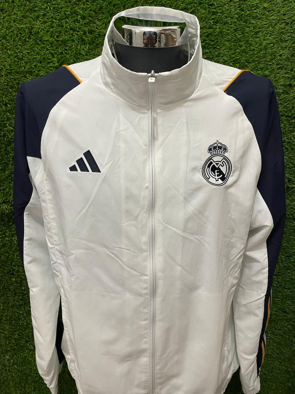 ROMPEVIENTOS REAL MADRID 2023 SIN GORRO