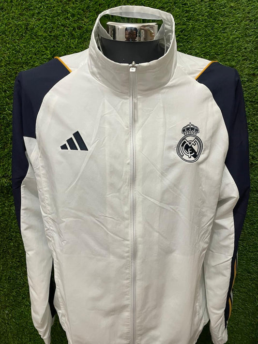ROMPEVIENTOS REAL MADRID 2023 SIN GORRO
